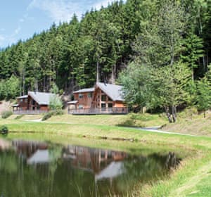 Family enjoying waterside stroll on their spring break