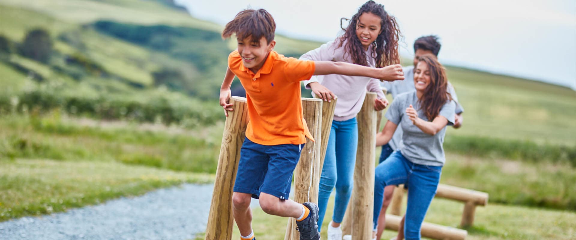 Family enjoying outdoor activities in countryside