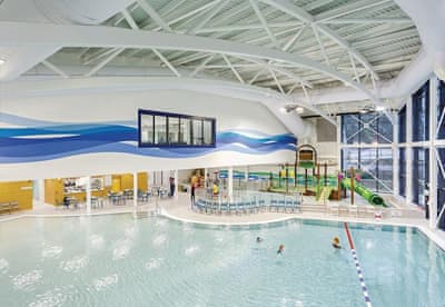 Indoor swimming pool with slides and much more