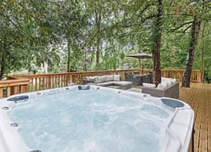 Bubbling hot tub on outdoor terrace 