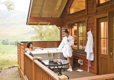 Couple enjoying outdoor hot tub 