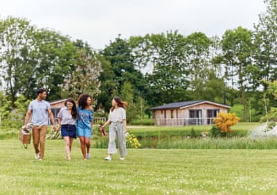 Friends exploring park outside their accommodation