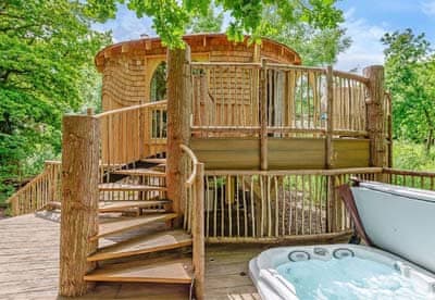 Luxury tree house style log cabin